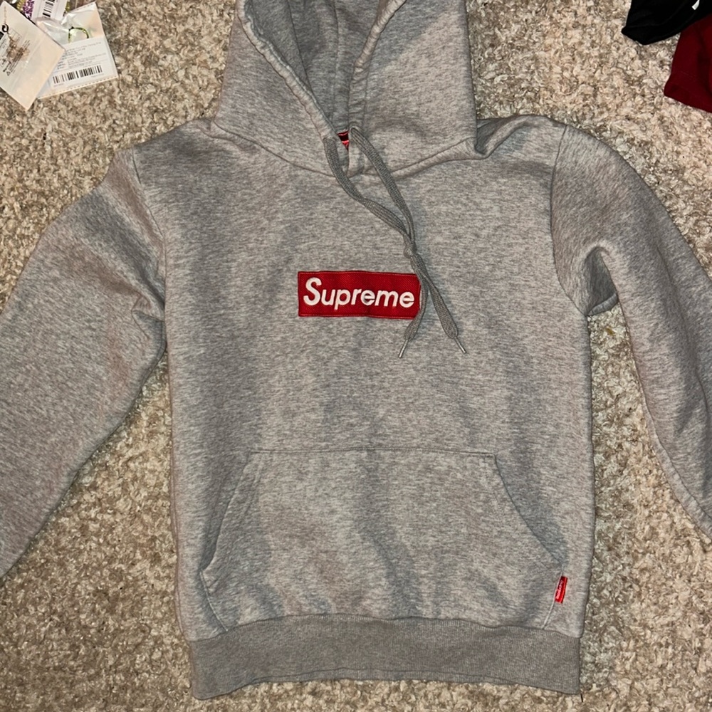 Sepreme Gray Hoodie with Red Printed Logo Across The Front